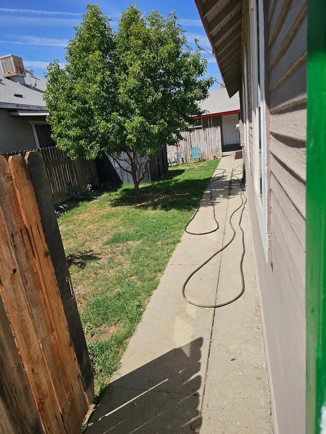 view of yard with fence