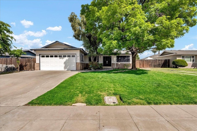 30 S Cambridge Dr, Lemoore, CA 93245 - ranch-style home with brick siding, driveway, and a garage