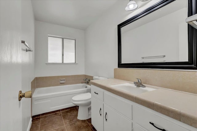 30 S Cambridge Dr, Lemoore, CA 93245 - full bath with a bath, toilet, vanity, and tile patterned floors