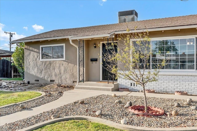 230 E Sycamore Dr, Hanford, CA 93230 - view of front of home featuring crawl space, stucco siding, and a chimney