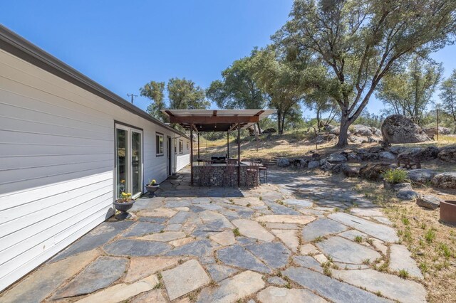 view of patio with outdoor dining area
