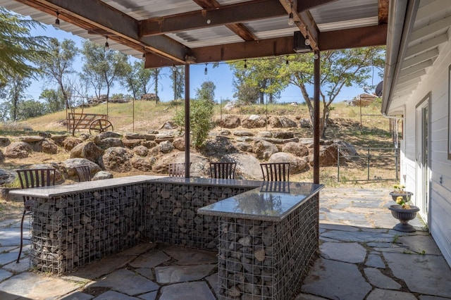 view of patio featuring outdoor dry bar