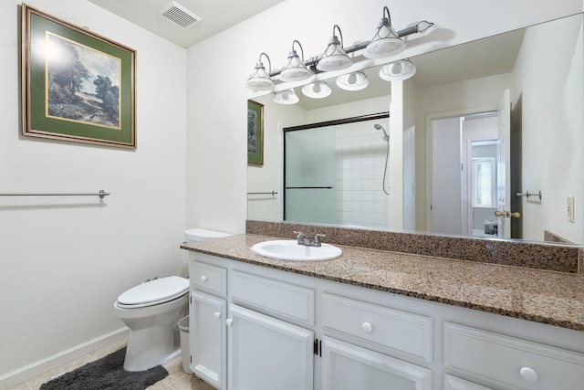 full bath with a tile shower, tile patterned floors, toilet, vanity, and visible vents
