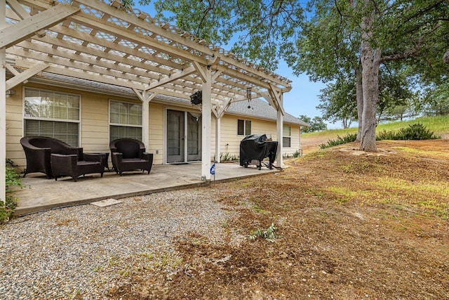 exterior space featuring a pergola and a patio area