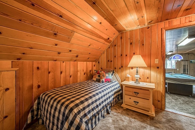 carpeted bedroom with wooden ceiling, wooden walls, and vaulted ceiling