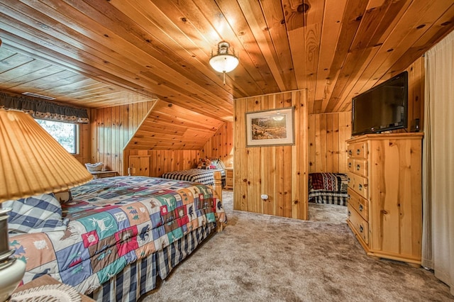 bedroom featuring wooden ceiling, wood walls, and carpet floors