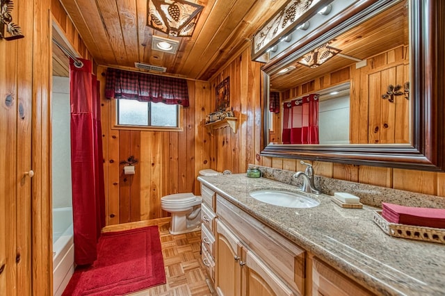 full bathroom with toilet, wood walls, vanity, and wood ceiling