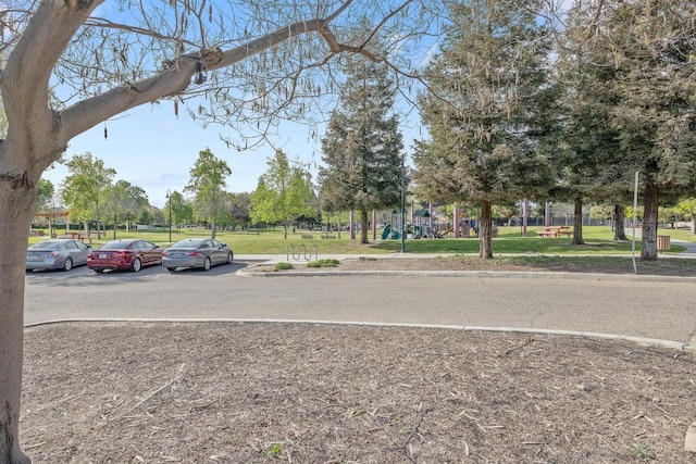 view of road with curbs and sidewalks