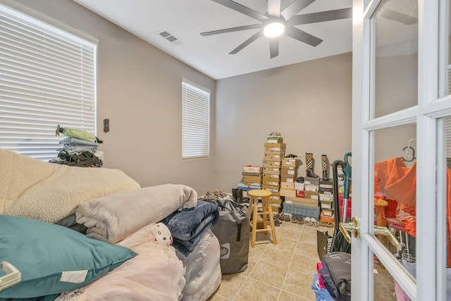 bedroom with visible vents and ceiling fan