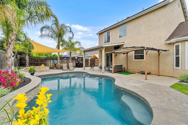 view of swimming pool featuring a fenced in pool, a pergola, a patio area, and a fenced backyard