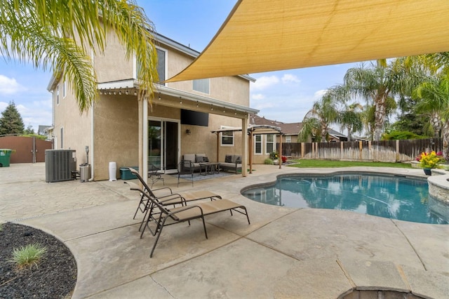 view of swimming pool featuring a fenced in pool, central AC unit, outdoor lounge area, and a fenced backyard