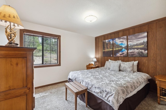 carpeted bedroom with baseboards