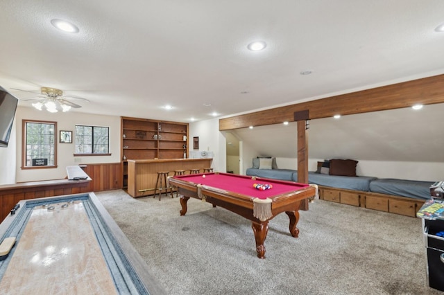 recreation room with recessed lighting, a ceiling fan, bar area, and carpet