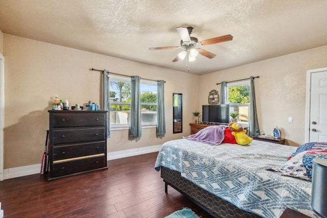 555 S Sierra Vista Ave, Fresno, CA 93702 - bedroom with a textured ceiling, ceiling fan, wood finished floors, and baseboards