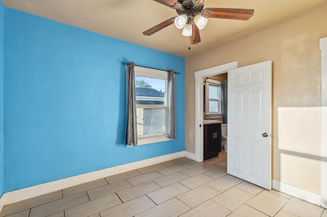 555 S Sierra Vista Ave, Fresno, CA 93702 - unfurnished room with a ceiling fan and baseboards