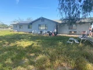 1554 N Blythe Ave, Fresno, CA 93722 - back of property with a lawn