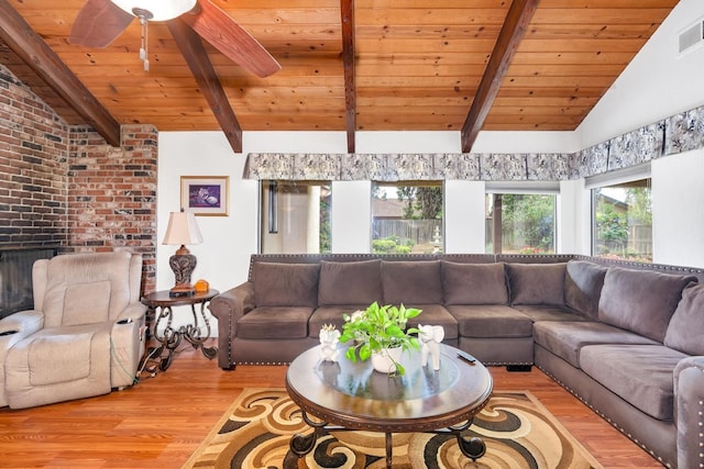 167 W Quincy Ave, Fresno, CA 93711 - living room with vaulted ceiling with beams, wood finished floors, and wood ceiling