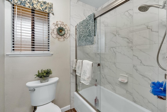167 W Quincy Ave, Fresno, CA 93711 - bathroom with shower / bath combination with glass door and toilet
