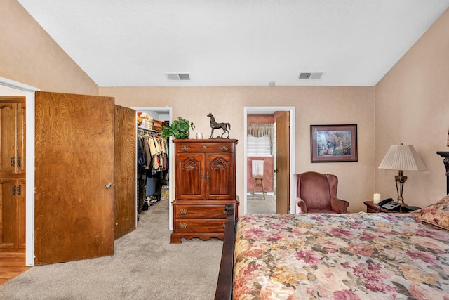 167 W Quincy Ave, Fresno, CA 93711 - carpeted bedroom with visible vents, a closet, and a walk in closet
