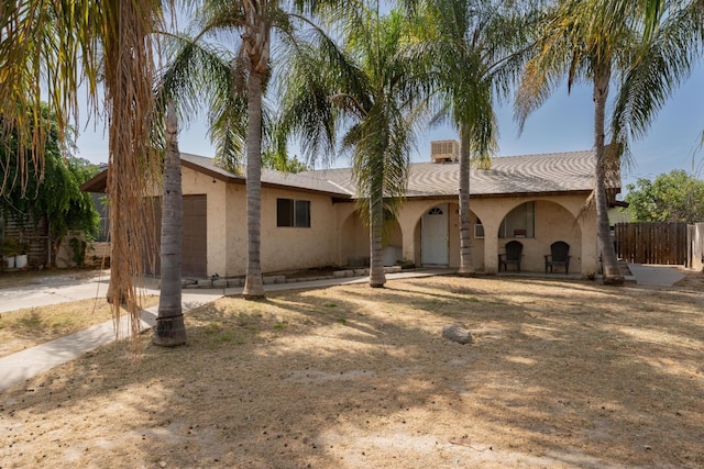 603 E Compton Ave, Pixley, CA 93256 - view of front of home featuring fence and stucco siding