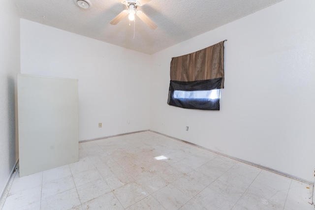 603 E Compton Ave, Pixley, CA 93256 - unfurnished room featuring a ceiling fan, tile patterned floors, and a textured ceiling