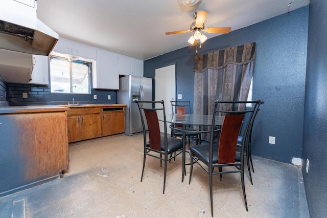 603 E Compton Ave, Pixley, CA 93256 - dining room featuring a ceiling fan and concrete flooring
