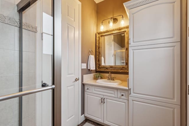 4918 W Bluff Ave, Fresno, CA 93722 - bathroom featuring a shower with door and vanity