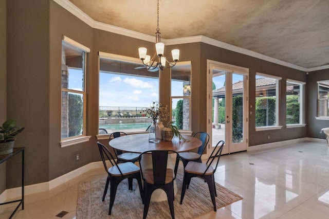 4918 W Bluff Ave, Fresno, CA 93722 - dining space featuring crown molding, baseboards, tile patterned floors, french doors, and a notable chandelier