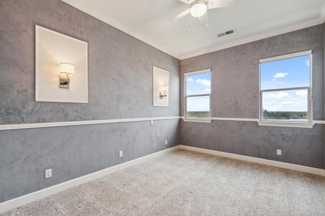 4918 W Bluff Ave, Fresno, CA 93722 - empty room featuring ornamental molding, ceiling fan, carpet flooring, baseboards, and visible vents