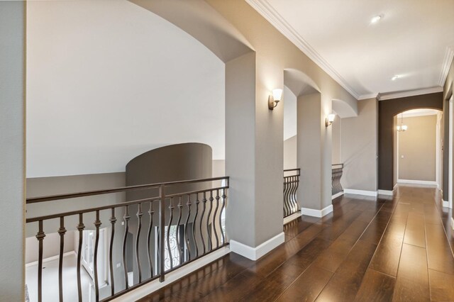 4918 W Bluff Ave, Fresno, CA 93722 - hall with hardwood / wood-style flooring, ornamental molding, baseboards, and arched walkways