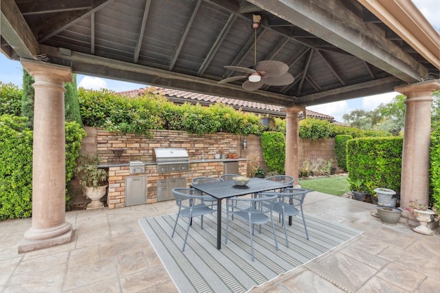 4918 W Bluff Ave, Fresno, CA 93722 - view of patio featuring outdoor dining space, a gazebo, area for grilling, and a ceiling fan