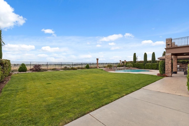 4918 W Bluff Ave, Fresno, CA 93722 - view of yard featuring fence, a patio area, and a fenced in pool