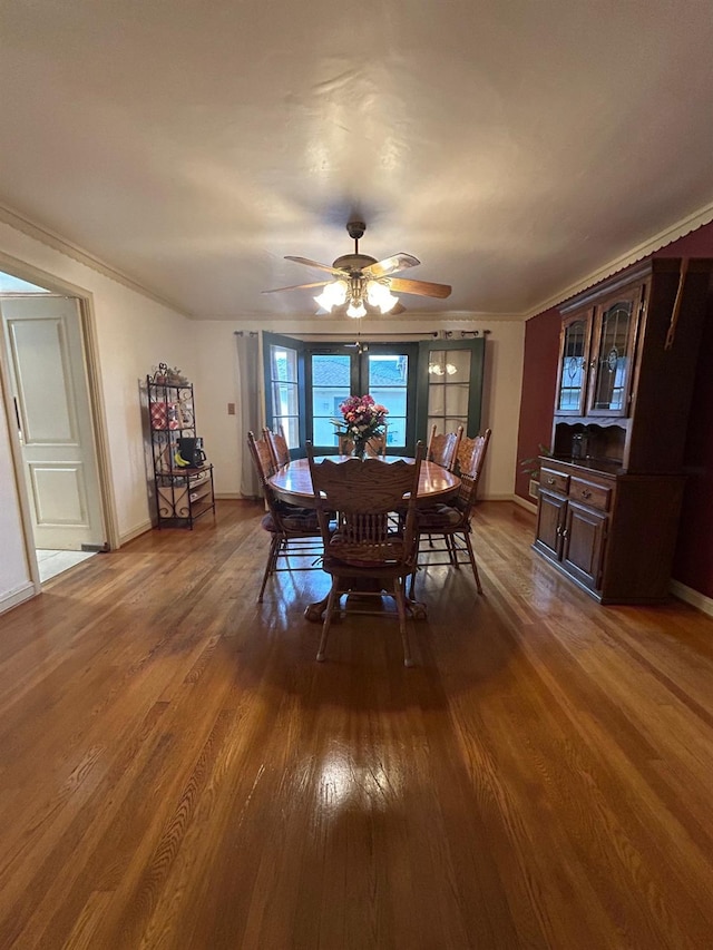 523 W Yosemite, Madera, CA 93637 - dining space with baseboards, ceiling fan, ornamental molding, and wood finished floors