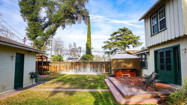 523 W Yosemite, Madera, CA 93637 - view of yard with a hot tub, a gazebo, and fence