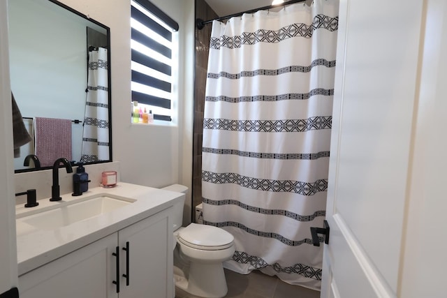 full bathroom featuring toilet, vanity, and a shower with shower curtain