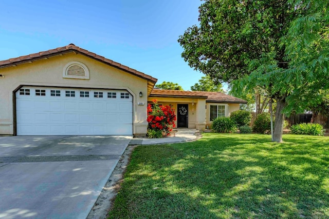 240 S Kenneth Ave, Kerman, CA 93630 - single story home featuring an attached garage, driveway, a front lawn, and stucco siding