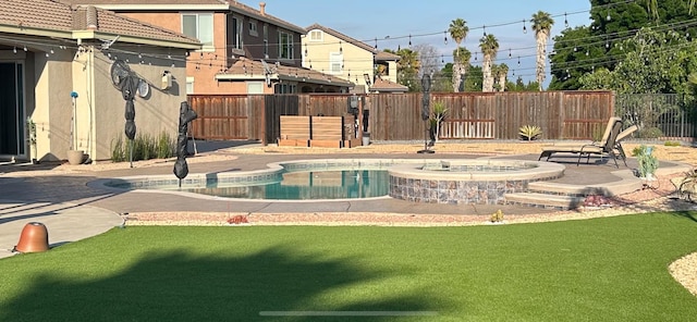 14335 Spyglass Cir, Chowchilla, CA 93610 - view of pool featuring a patio area and a pool with connected hot tub