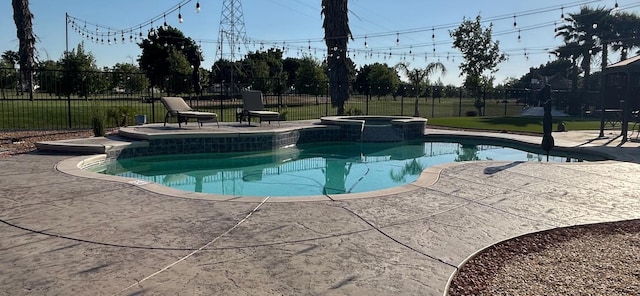 14335 Spyglass Cir, Chowchilla, CA 93610 - view of pool featuring a patio and a pool with connected hot tub