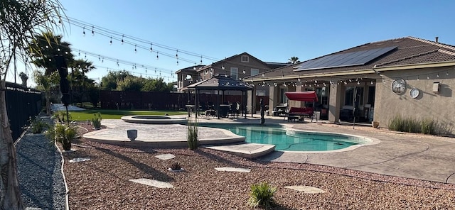14335 Spyglass Cir, Chowchilla, CA 93610 - view of swimming pool with a gazebo, a patio area, and a fenced backyard
