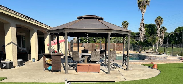 14335 Spyglass Cir, Chowchilla, CA 93610 - view of property's community featuring a gazebo, a fenced backyard, a patio, a hot tub, and a pool