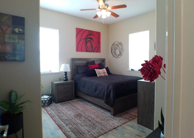 14335 Spyglass Cir, Chowchilla, CA 93610 - bedroom featuring wood finished floors and a ceiling fan
