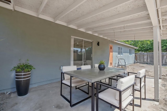 465 W Woods Ave, Tipton, CA 93272 - view of patio featuring fence and outdoor dining space