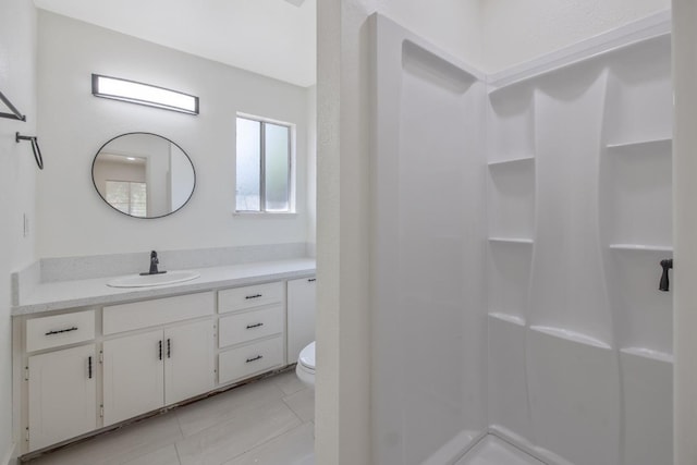 465 W Woods Ave, Tipton, CA 93272 - full bathroom featuring toilet, tile patterned flooring, a shower, and vanity