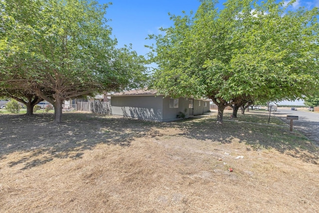 465 W Woods Ave, Tipton, CA 93272 - exterior space with fence