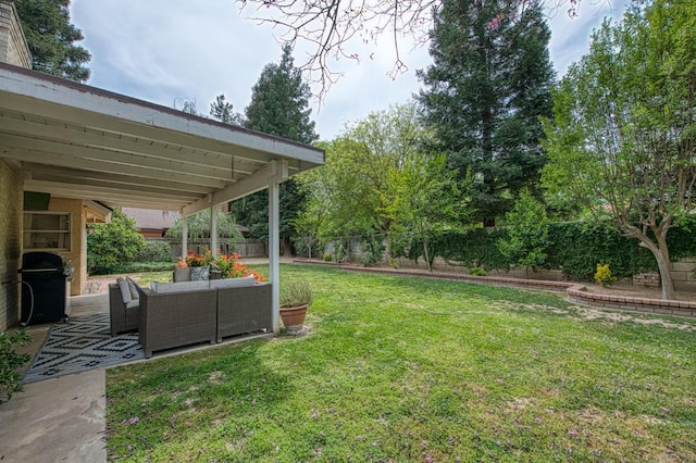 view of yard with a patio, an outdoor hangout area, and a fenced backyard