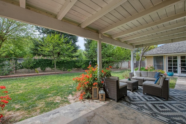 view of patio / terrace with outdoor lounge area, french doors, and a fenced backyard