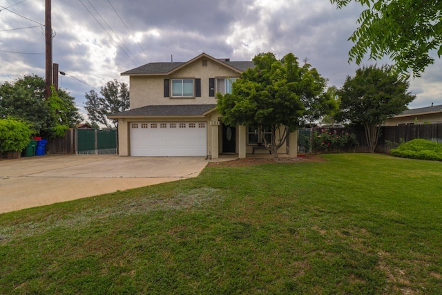 view of front of home with fence, a front lawn, concrete driveway, an attached garage, and stucco siding