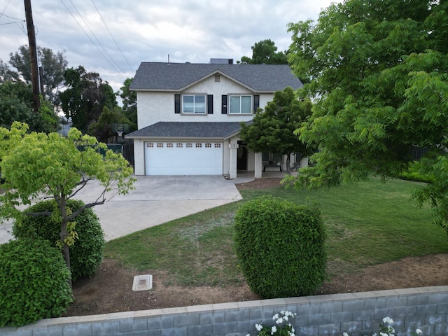 view of front facade with a garage, a front yard, stucco siding, a shingled roof, and driveway