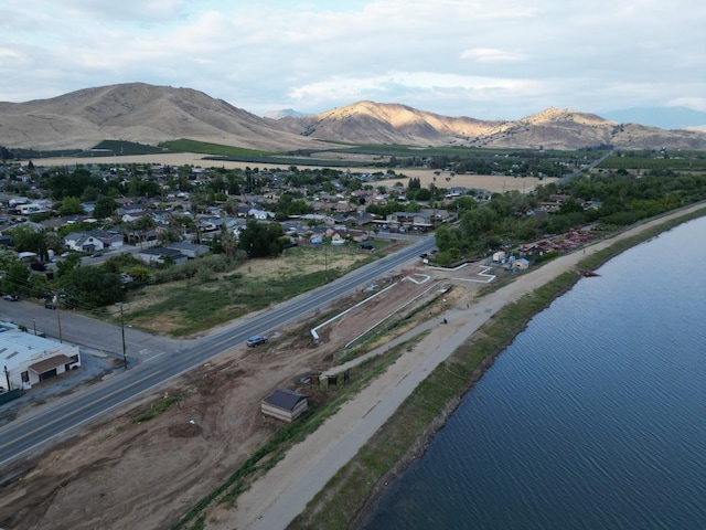 aerial view with a water and mountain view