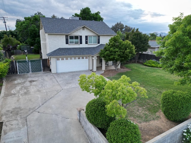 view of front of property with a front yard, a garage, fence, concrete driveway, and stucco siding